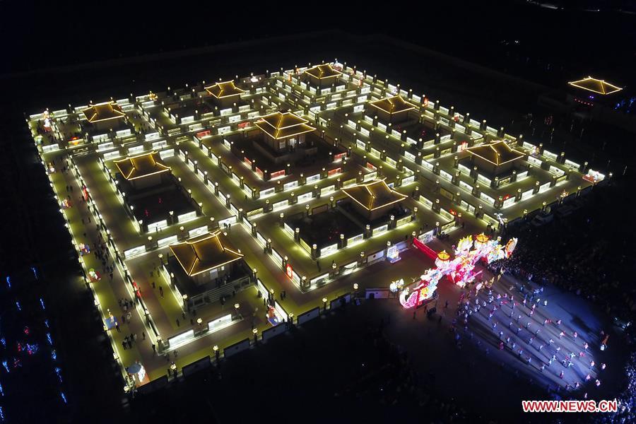 Aerial photo taken on Feb. 12, 2019 shows the Winding Yellow River Lamp Array, a temporary maze installation for the locals to go through to get a good omen in the rest days of the year, in Gucheng Village of Jiantan Town in Zhangye City, northwest China\'s Gansu Province. (Xinhua/Fan Peishen)