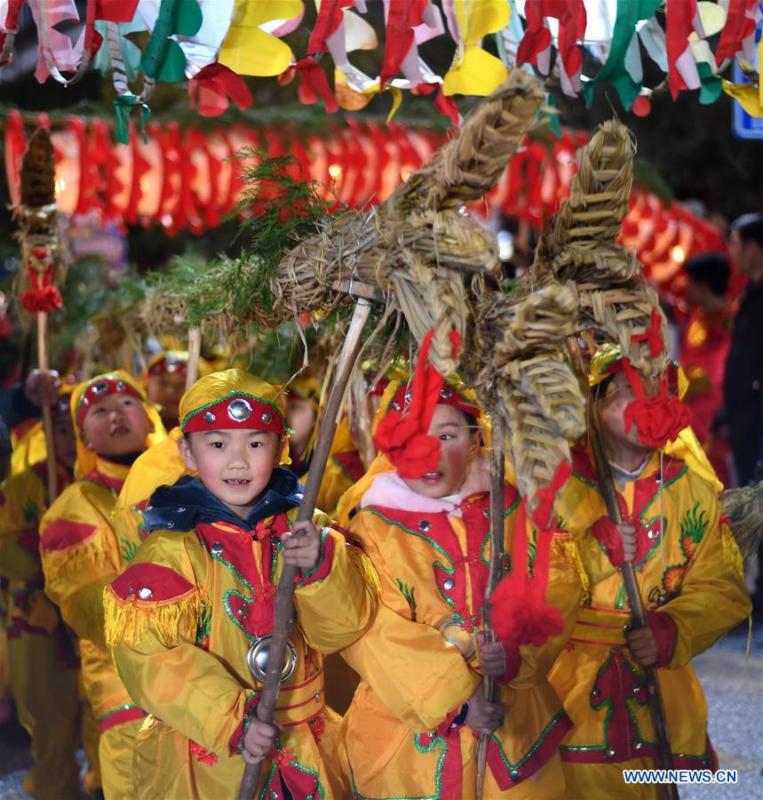 Children perform dragon dance to celebrate the upcoming Lantern Festival, which falls on Feb. 19 this year, in Shibing County, southwest China\'s Guizhou Province, Feb. 13, 2019. (Xinhua)