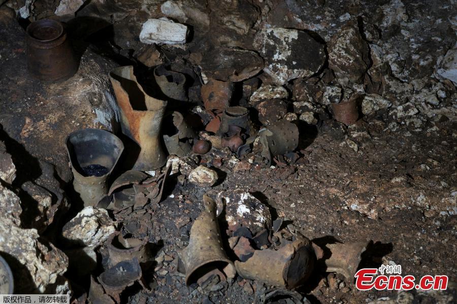 Pre-columbian artifacts sit in a cave at the Mayan ruins of Chichen Itza, Yucatan, Mexico, March 5, 2019. Mexican archaeologists say they have found a cave at the Mayan ruins of Chichen Itza with offerings of about 200 ceramic vessels in nearly untouched condition. The National Institute of Anthropology and History says the vessels appear to date back to around 1,000 A.D. (Photo/Agencies)