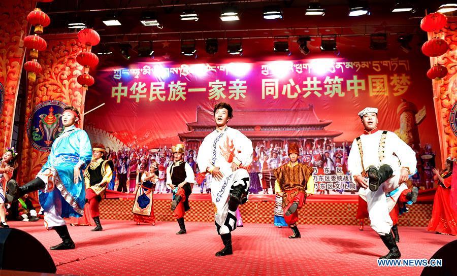 Performers dance during a performance to mark Tibet\'s Serfs\' Emancipation Day in Shannan, southwest China\'s Tibet Autonomous Region, March 26, 2019. Serfs\' Emancipation Day was formally established on March 28. (Xinhua/Zhang Rufeng)