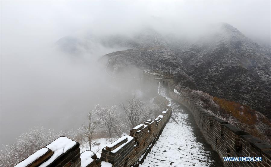 Photo taken on April 9, 2019 shows the snowy scenery of the Mutianyu Great Wall in Beijing, capital of China. (Xinhua/Bu Xiangdong)