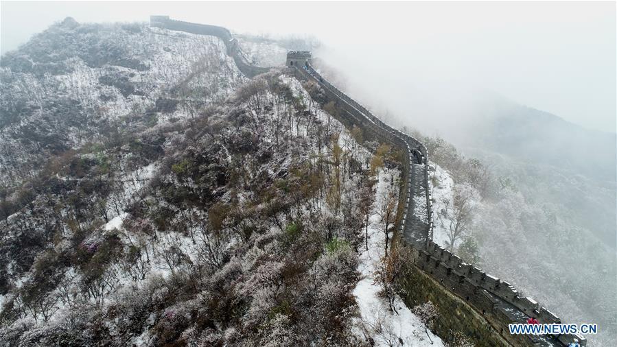 Aerial photo taken on April 9, 2019 shows the snowy scenery of the Mutianyu Great Wall in Beijing, capital of China. (Xinhua/Bu Xiangdong)
