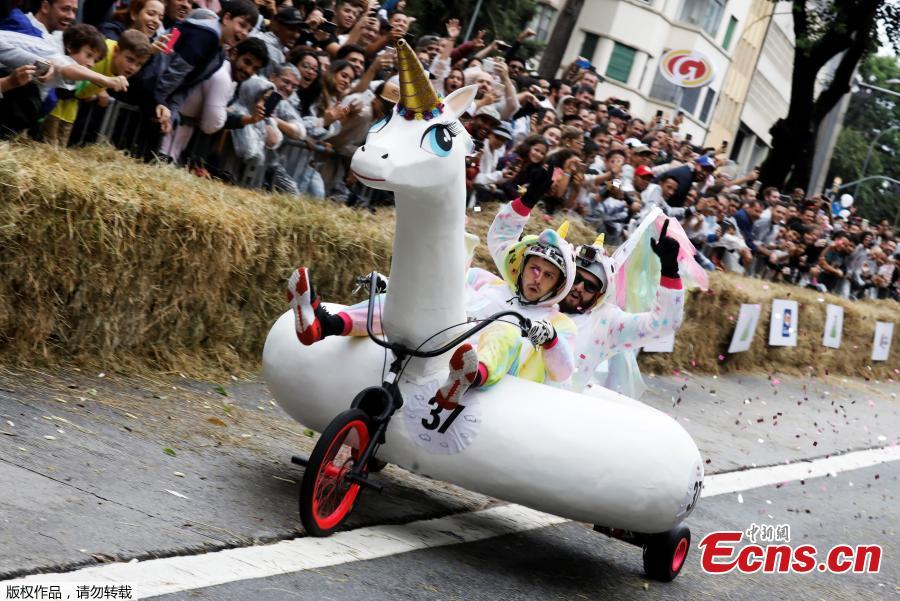 Competitors ride a homemade vehicle on a downhill track during the Red Bull Soapbox Race in Sao Paulo, Brazil, April 14, 2019. The Red Bull Soapbox race is an annual event where amateur drivers race their homemade soapbox vehicles down a hill through obstacles. (Photo/Agencies)