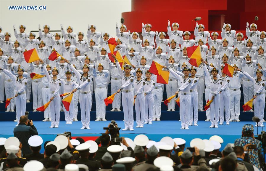 A joint military music display is held to celebrate the People\'s Liberation Army Navy\'s 70th founding anniversary in Qingdao, east China\'s Shandong Province, April 22, 2019. The military bands from the navies of China, Thailand, Vietnam, Bangladesh and India performed at the event. Over 1,200 people, including officers and soldiers of navy vessels from home and abroad and Qingdao citizens, viewed the performance. (Xinhua/Zhu Zheng)