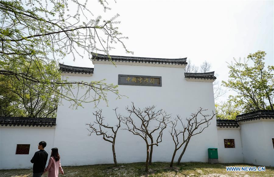 People visit the Chinese garden at the Suncheon Bay National Garden in Suncheon, South Korea, April 20, 2019. The Suncheon Bay National Garden, located in South Korea\'s southern city of Suncheon, is the hosting place of Suncheon Bay Garden Expo 2013. (Xinhua/Wang Jingqiang)