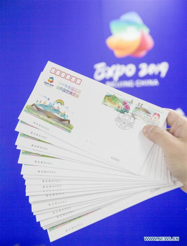 The first-day covers with commemorative stamps to mark the International Horticultural Exhibition 2019 Beijing are pictured at the media center in Yanqing District of Beijing, capital of China, April 29, 2019. Beijing Stamp Company issued the first-day cover with a set of two commemorative stamps on Monday. (Xinhua/Hou Dongtao)