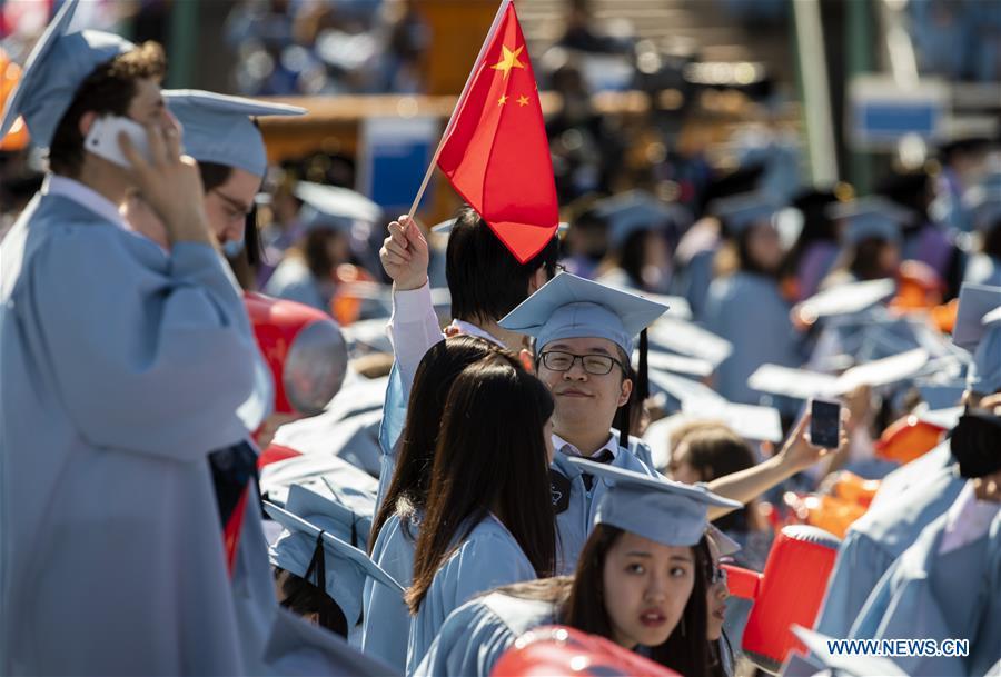 Graduate students from China attend the Columbia University Commencement ceremony in New York, the United States, May 22, 2019. The Columbia University Commencement ceremony of the 265th academic year took place on Wednesday. More than 17,000 students from Columbia\'s 18 schools and affiliates graduated this year. (Xinhua/Wang Ying)