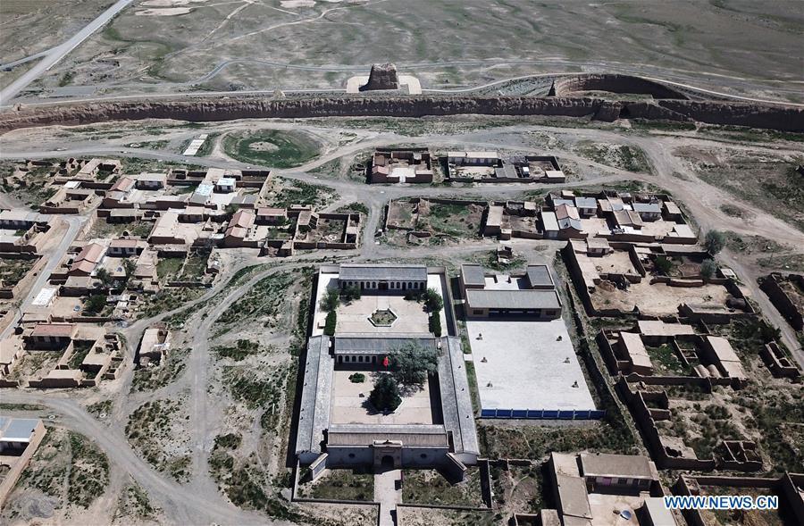 Aerial photo taken on May 28, 2019 shows a view of the Yongtai ancient city in Jingtai County of Baiyin, northwest China\'s Gansu Province. Construction of the Yongtai ancient city began in the early 17th century and the complex used to be a military fortress. Girdled by 12-meter wall structures totaling 1.7 kilometers in length, the Yongtai ancient city looks like a turtle when seen from above and is thus dubbed \
