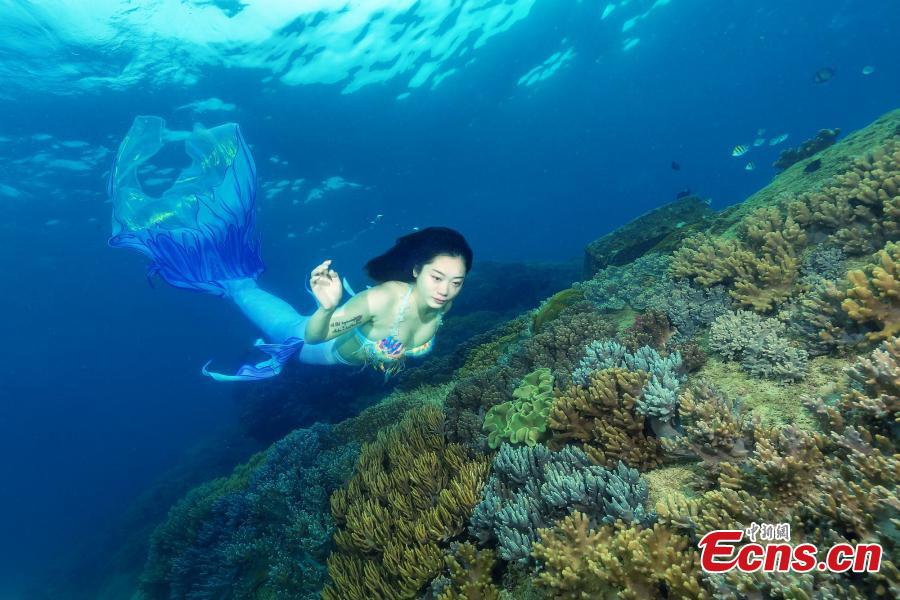 A photograph of a model posing like a mermaid underwater at the Wuzhizhou Island scenic spot captured by photographer Wang Baomin during a four-day photo contest in Sanya City, Hainan Province. (Photo/China News Service)