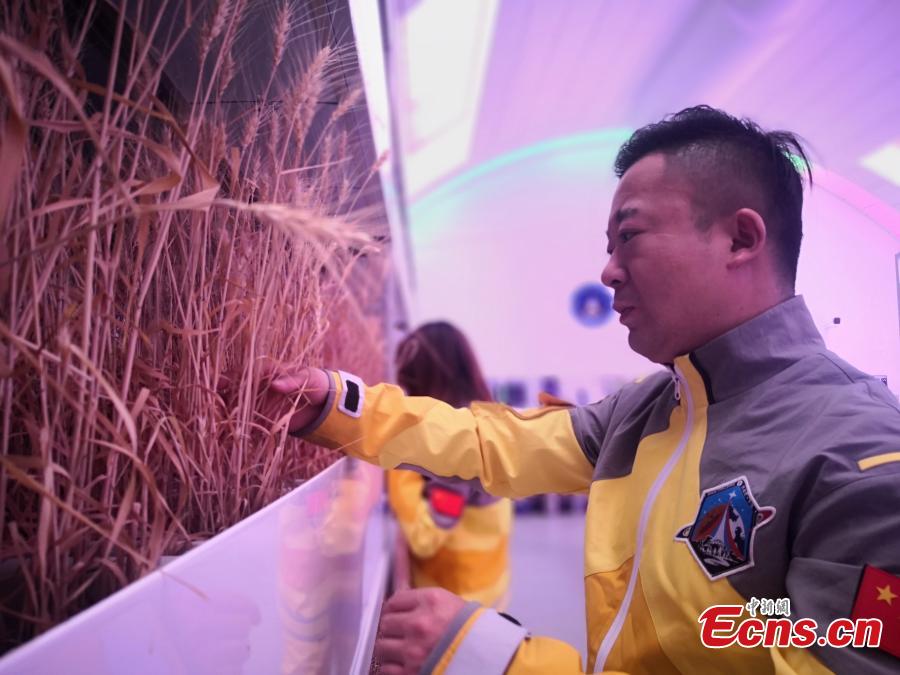 Visitors inside a Mars simulation base in the barren, windswept hills of Jinchang City, Northwest China’s Gansu Province, May 29, 2019. Planned to cover 67 square kilometers, Mars Base 1 Camp will include nine modules including a greenhouse and a mock decompression chamber. Authorities hope the camp will boost tourism and allow visitors to feel as though they are on the Red Planet.  (Photo: China News Service/Wei Jianjun)