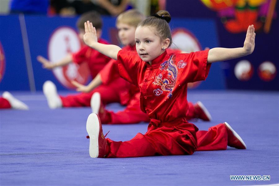 Competitors perform during the opening ceremony for the Moscow Wushu Stars 2019 competition in Moscow, Russia on Feb. 23, 2019. (Xinhua/Bai Xueqi)