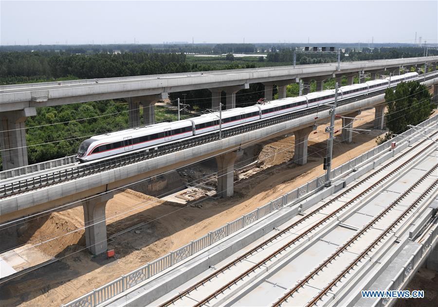 A train runs on a new airport subway line for trial in Beijing, capital of China, June 15, 2019. Self-driving trains for the subway line connecting downtown Beijing with its new international airport started trial run Saturday, according to local authorities. Stretching 41.4 kilometers, the new line supports autopilot system and can run at a speed of 160 km per hour, with as many as 448 passengers, according to Beijing Major Projects Construction Headquarters Office. (Xinhua/Zhang Chenlin)