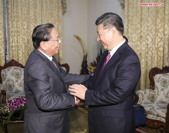 Xi meets former Lao president