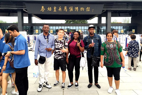 Students studying in China join a group to visit the Terracotta Warriors museum in Xi'an, Shaanxi province. (Photo by Yang Feiyue/China Daily) Students studying in China join a group to visit the Terracotta Warriors museum in Xi'an, Shaanxi province. (Photo by Yang Feiyue/China Daily)
