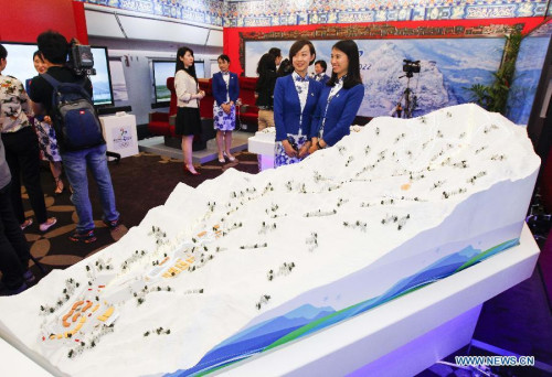 Visitors view sandbox models at the expo of Beijing Candidate City's bid for the 2022 Winter Olympic games at the Palace hotel in Lausanne, Switzerland, on June 10, 2015. (Photo: Xinhua/Zhou Lei) Visitors view sandbox models at the expo of Beijing Candidate City's bid for the 2022 Winter Olympic games at the Palace hotel in Lausanne, Switzerland, on June 10, 2015. (Photo: Xinhua/Zhou Lei)