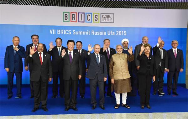 Chinese President Xi Jinping poses for photos with leaders of the Shanghai Cooperation Organization (SCO) members and observers, the Eurasian Economic Union (EEU) leaders, leaders of invited countries and the BRICS nations, namely Brazil, Russia, India, China and South Africa in Ufa, Russia, July 9, 2015. (Xinhua/Rao Aimin) Chinese President Xi Jinping poses for photos with leaders of the Shanghai Cooperation Organization (SCO) members and observers, the Eurasian Economic Union (EEU) leaders, leaders of invited countries and the BRICS nations, namely Brazil, Russia, India, China and South Africa in Ufa, Russia, July 9, 2015. (Xinhua/Rao Aimin)