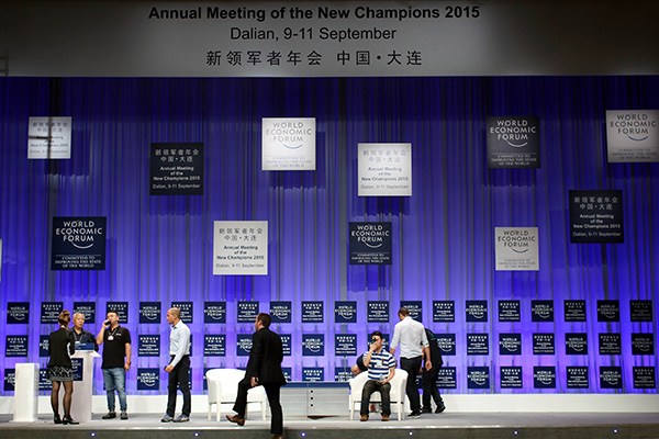 Organizing staff prepare for the upcoming Annual Meeting of the New Champions 2015 in Dalian. (Photo/Xinhua) Organizing staff prepare for the upcoming Annual Meeting of the New Champions 2015 in Dalian. (Photo/Xinhua)