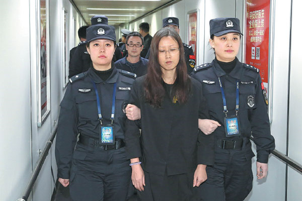 Zhang Qingzhao, who featured on an Interpol list of China's 100 most-wanted fugitives was repatriated from the Caribbean state of Saint Vincent and the Grenadines on Feb 6, 2016. (Photo/Xinhua) Zhang Qingzhao, who featured on an Interpol list of China's 100 most-wanted fugitives was repatriated from the Caribbean state of Saint Vincent and the Grenadines on Feb 6, 2016. (Photo/Xinhua)
